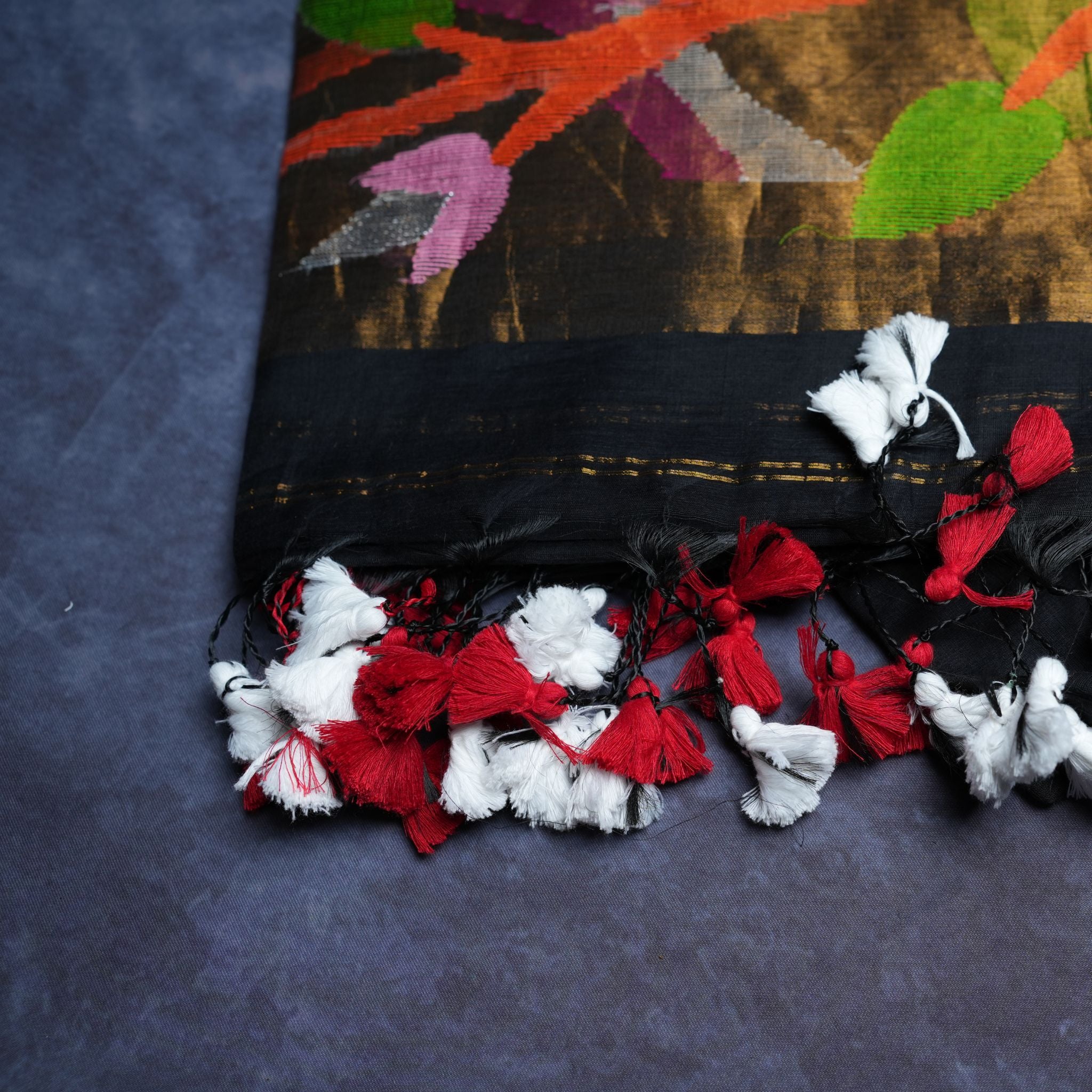 Muslin Jamdani Handwoven Suit Set with Multicolour Art Motifs & Tassel Dupatta (Black Base)